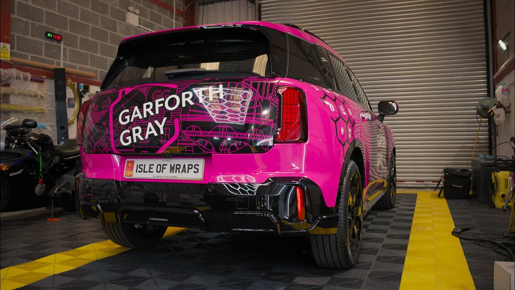 A wrapped Garforth Gray Mini in the Isle of Wraps workshop, tailgate finished