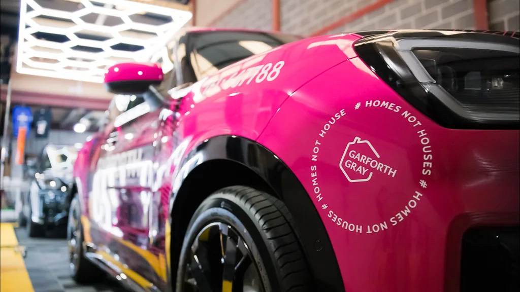 The Homes not houses ring on the rear quarter of the wrapped Mini
