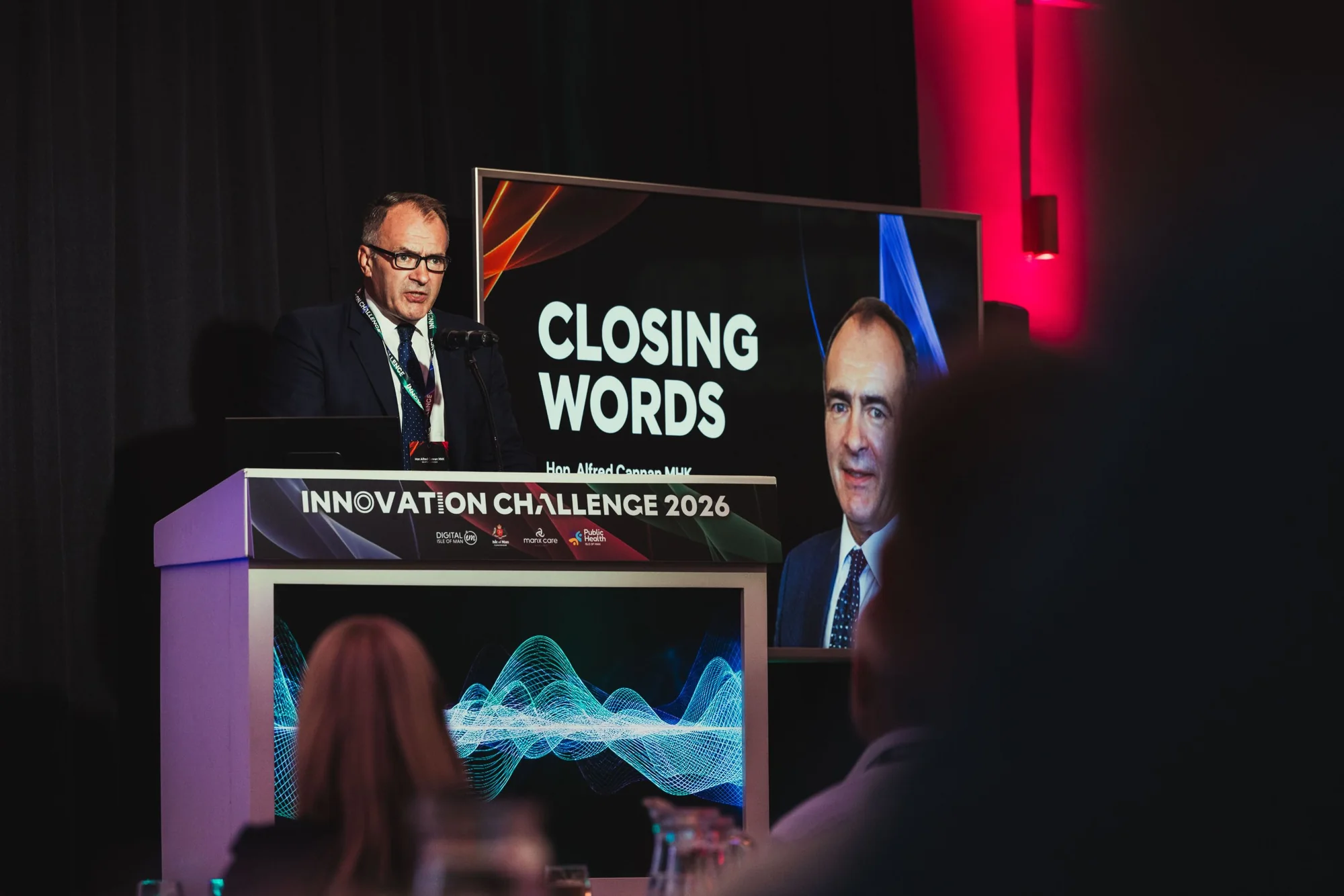 Hon Alfred Cannan MHK delivering the closing words at Innovation Challenge 2026